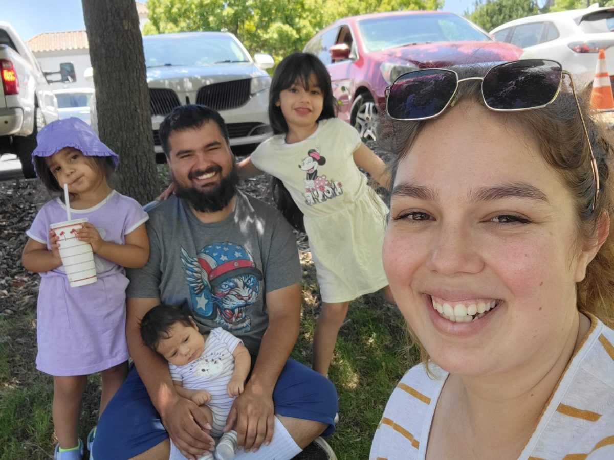 ‘We’re graduating together’: Cal Poly student celebrates with kids by her side